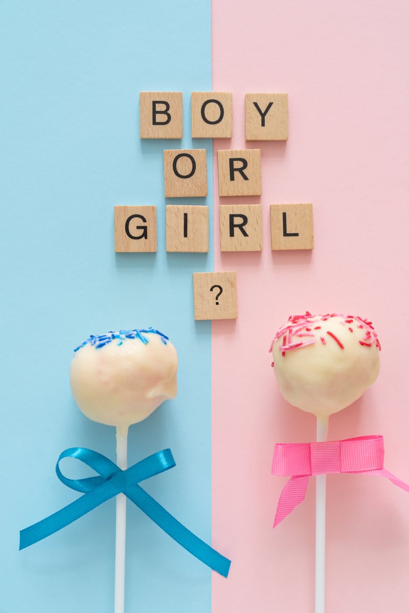 Gender reveal party concept - where parents and friends find out the  of the baby